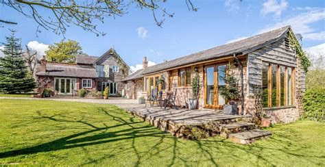 84 acres, excellent equestrian and outdoor facilities. . Converted barn for sale malpas